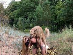 Outdoor sex of a slut and her dog xxx